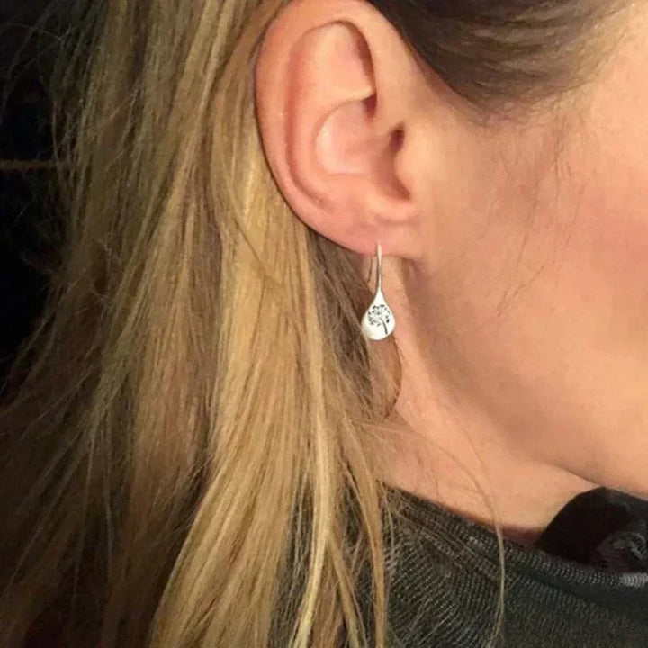 Victoria Elegant Silver Earrings in Dandelion Leaf Design |